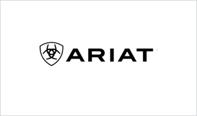 Black ariat logo featuring a shield emblem with a stylized biohazard symbol inside, positioned to the left of bold black lettering.